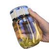 The new thickened heat-resistant glass cup, portable tea-water separation glass cup, compact and suitable for both men and women, large-capacity dwen Dwen cup Item Picture